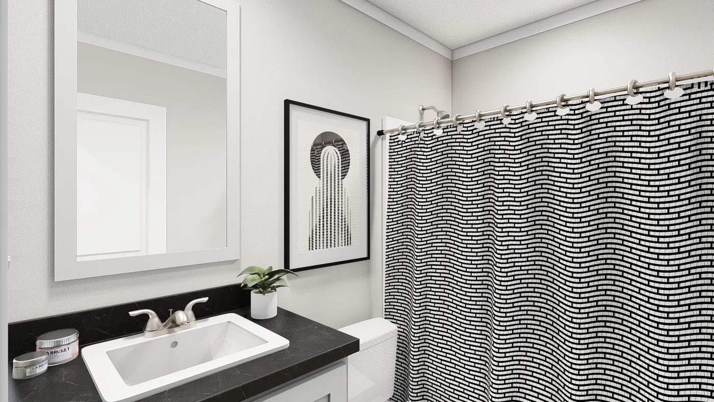 The HERE COMES THE SUN Guest Bathroom. This Manufactured Mobile Home features 3 bedrooms and 2 baths.