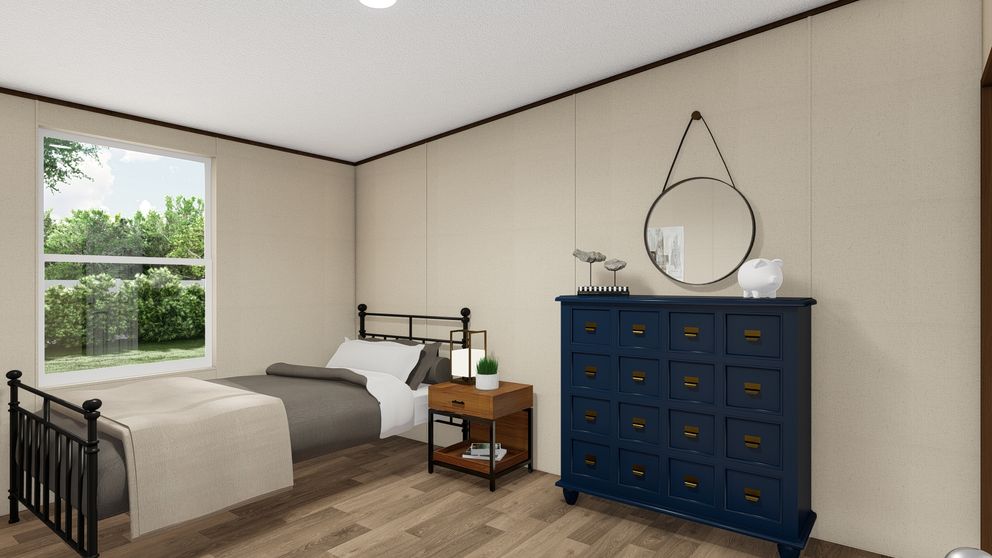 The THRILL Bedroom. This Manufactured Mobile Home features 3 bedrooms and 2 baths.