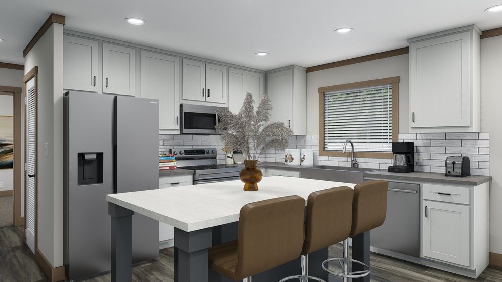 The ANNIE Kitchen. This Manufactured Mobile Home features 3 bedrooms and 2 baths.