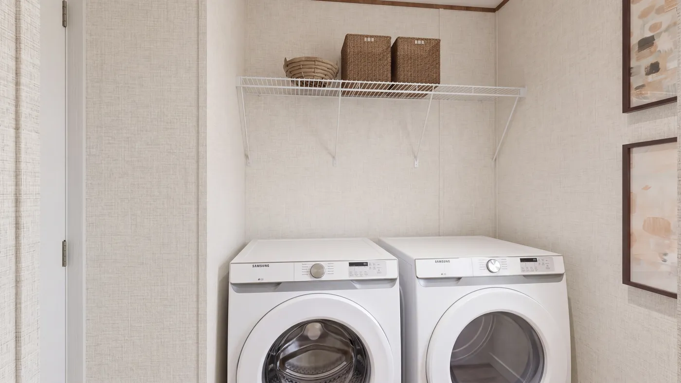 The SYCAMORE Utility Room. This Manufactured Mobile Home features 4 bedrooms and 2 baths.