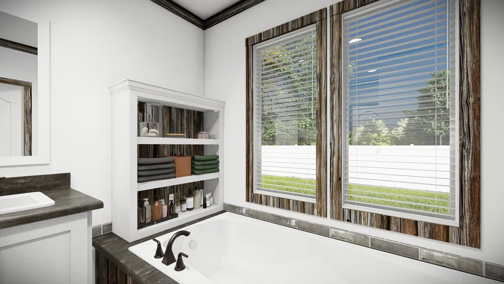 The THE BANDIT Primary Bathroom. This Manufactured Mobile Home features 3 bedrooms and 2 baths.