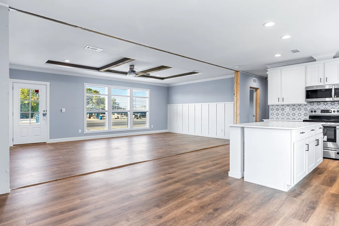 The THE MATTERHORN Living Room. This Manufactured Mobile Home features 3 bedrooms and 2 baths.