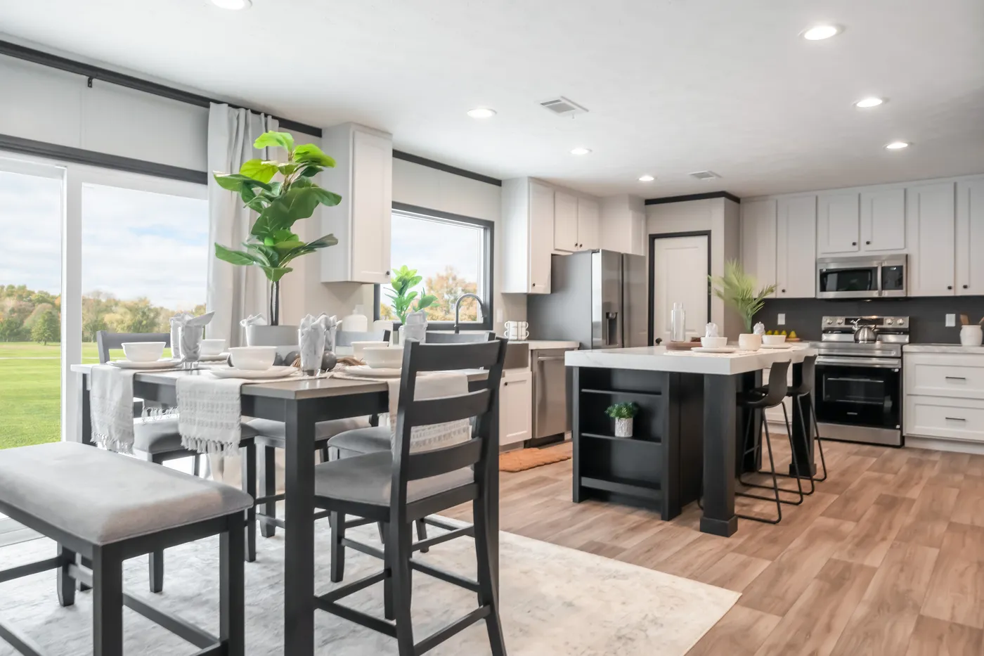 The THE ANNIVERSARY 2.1 Dining Area. This Manufactured Mobile Home features 3 bedrooms and 2 baths.