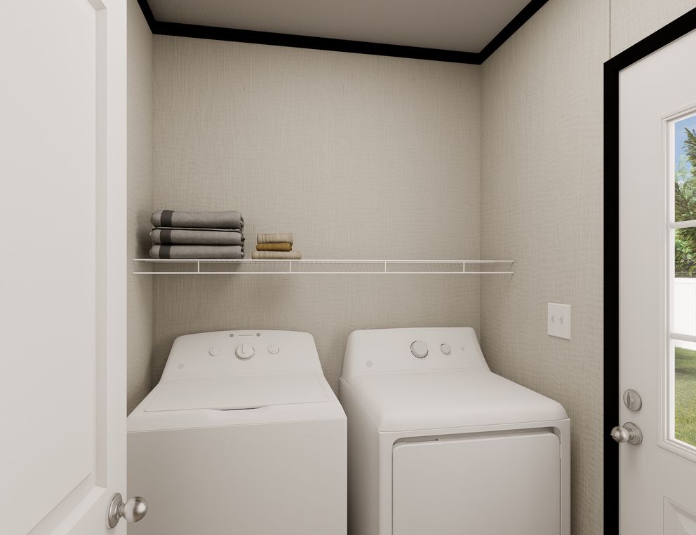 The ULTRA FLEX Utility Room. This Manufactured Mobile Home features 3 bedrooms and 2 baths.