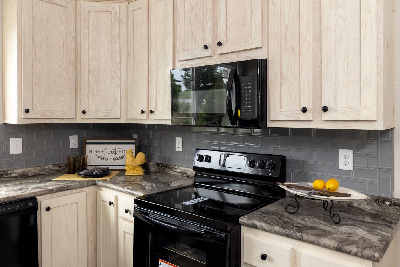 The THE ROGUE Kitchen. This Manufactured Mobile Home features 3 bedrooms and 2 baths.
