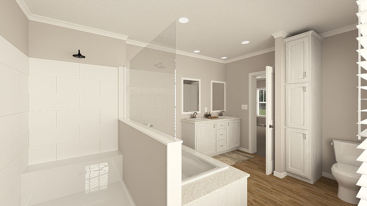 The THE HEXAGON Primary Bathroom. This Manufactured Mobile Home features 4 bedrooms and 3 baths.