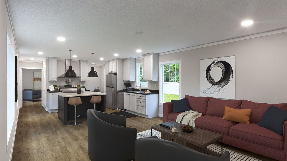 The SWEET CAROLINE Living Room. This Manufactured Mobile Home features 3 bedrooms and 2 baths.