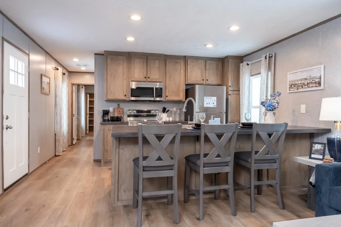 The WARRIOR II Kitchen. This Manufactured Mobile Home features 2 bedrooms and 2 baths.