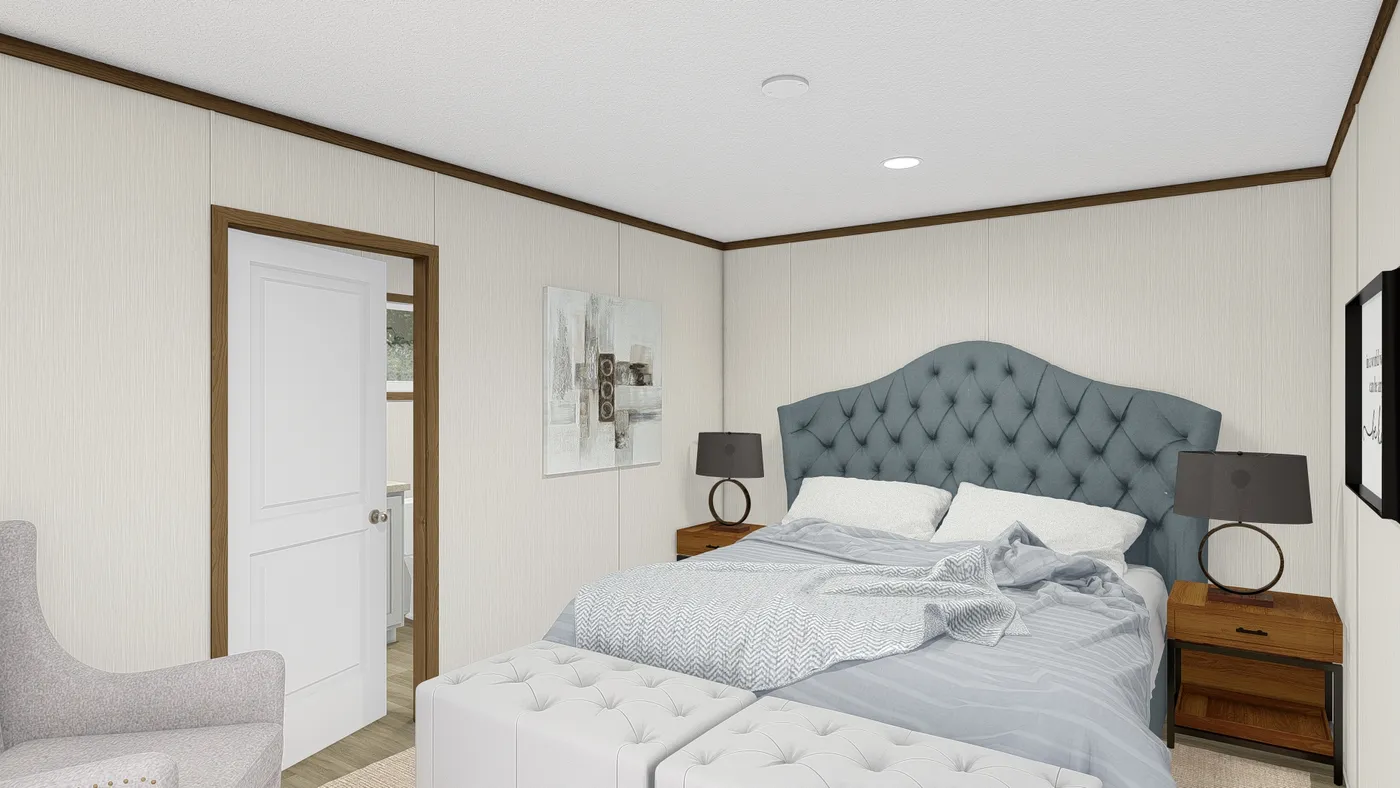 The THE INTUITION Primary Bedroom. This Manufactured Mobile Home features 3 bedrooms and 2 baths.