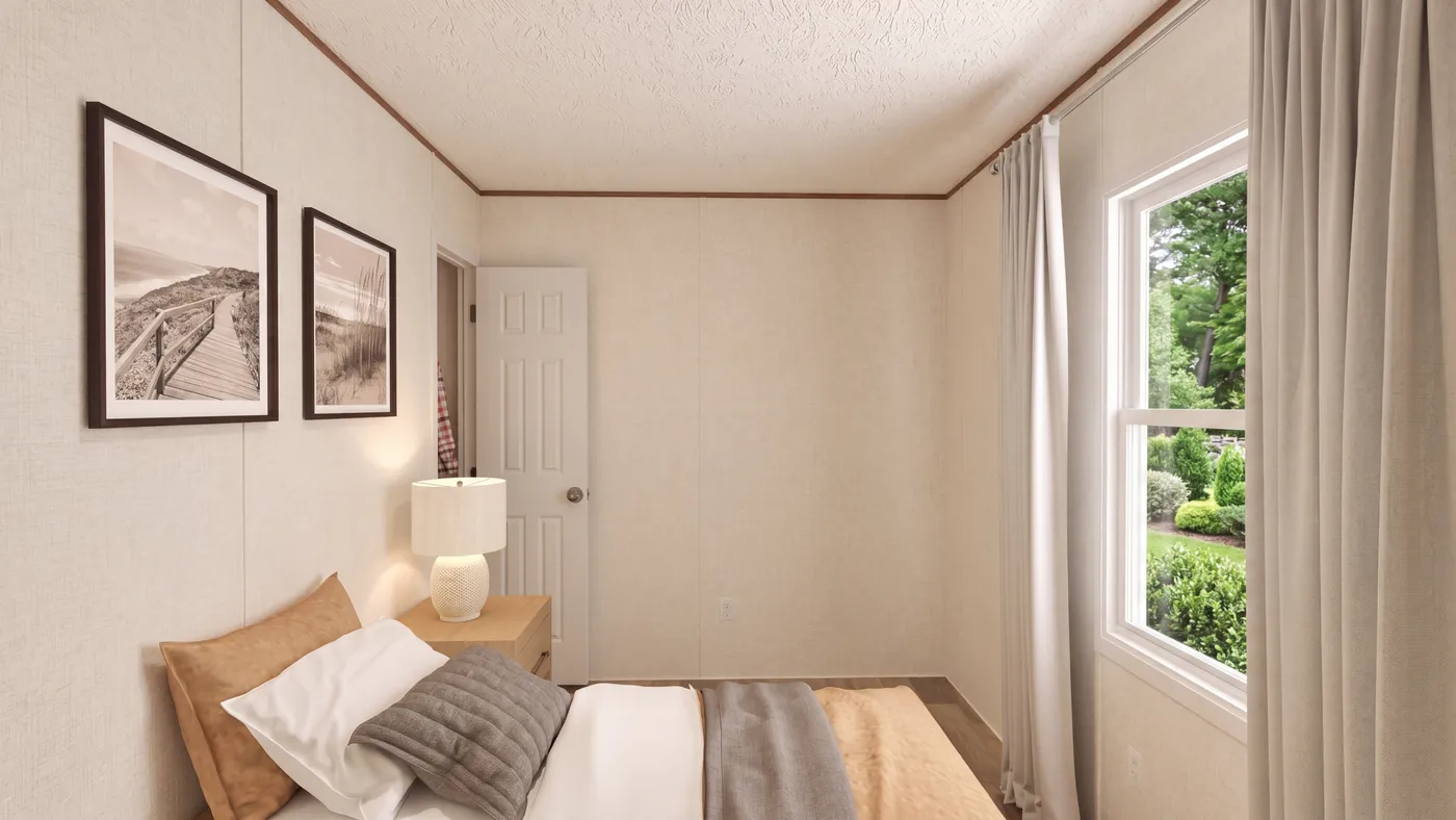 The HICKORY Guest Bedroom. This Manufactured Mobile Home features 3 bedrooms and 2 baths.