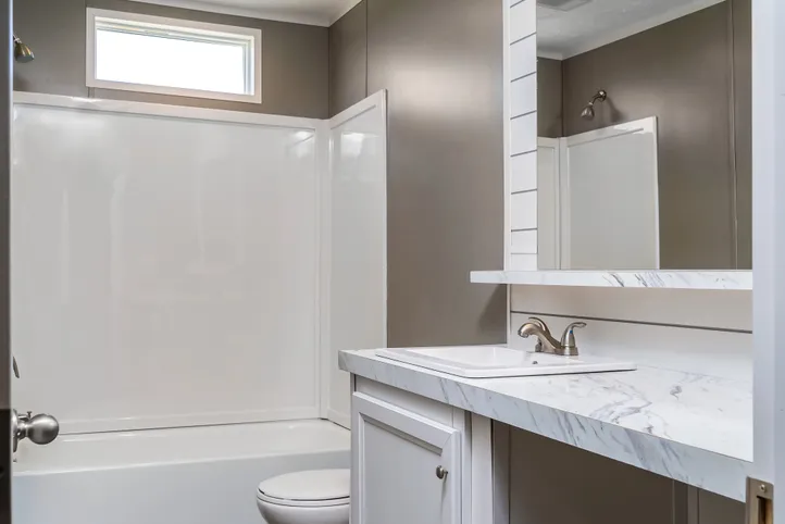 The LOCKLEAR Exterior. This Manufactured Mobile Home features 4 bedrooms and 2 baths.