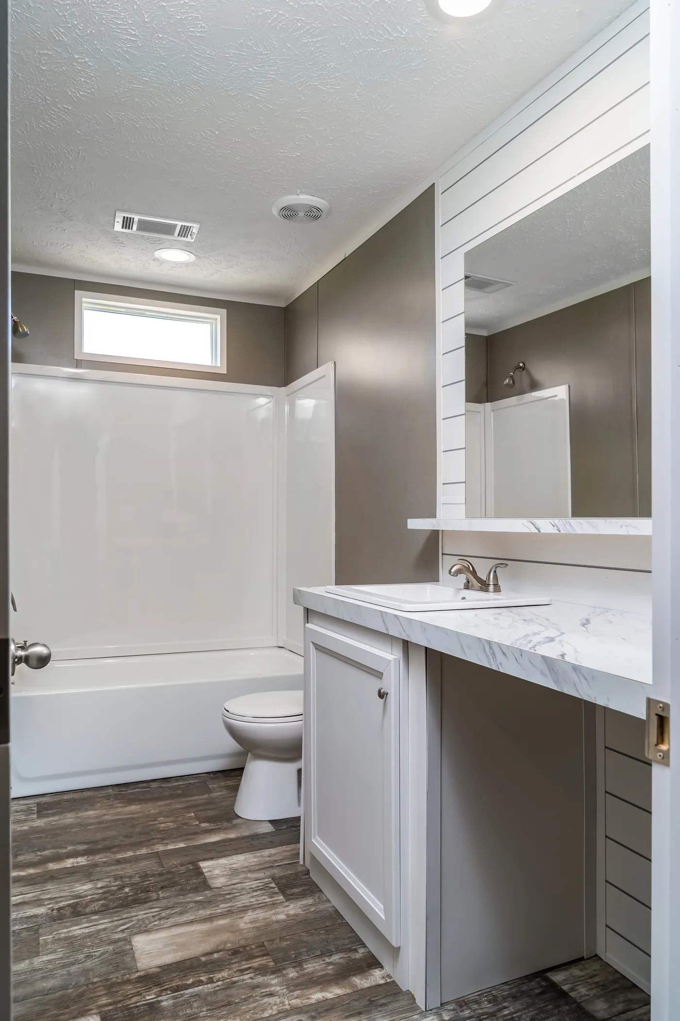 The LOCKLEAR Exterior. This Manufactured Mobile Home features 4 bedrooms and 2 baths.