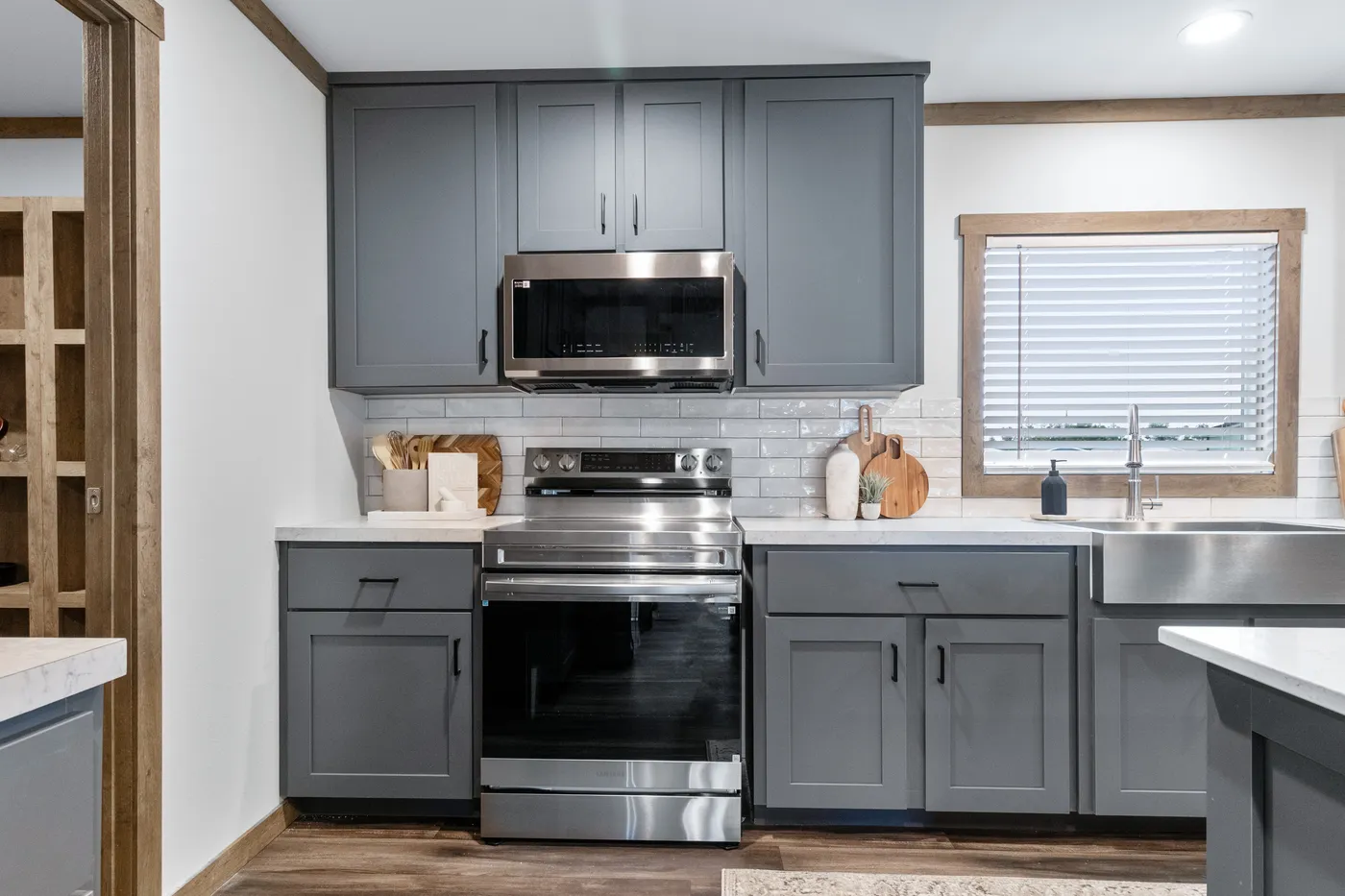 The EVERETT ELITE Kitchen. This Manufactured Mobile Home features 4 bedrooms and 3 baths.
