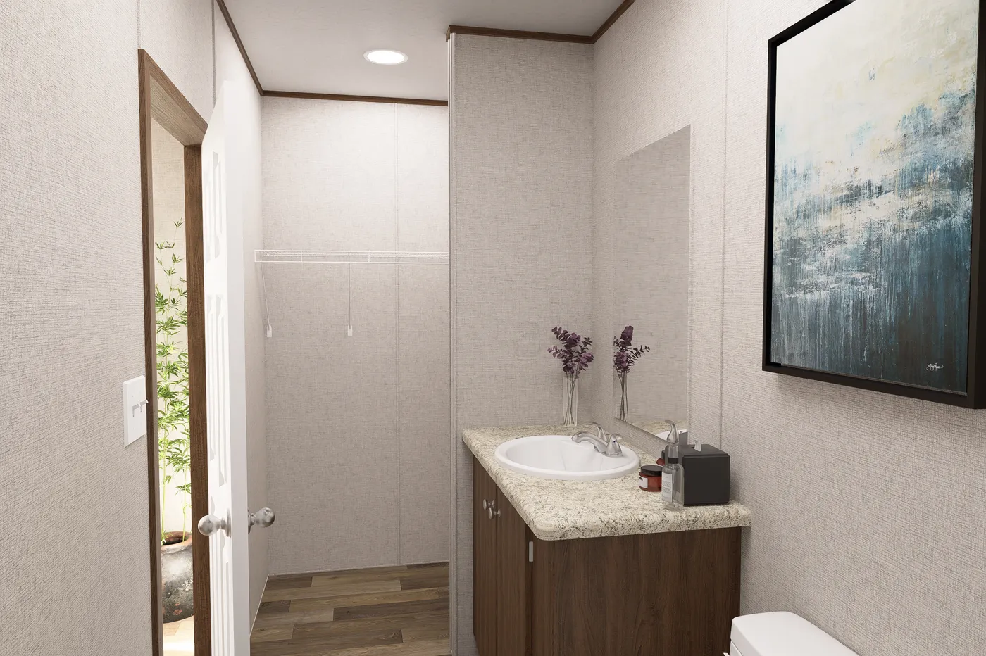The HICKORY Primary Bathroom. This Manufactured Mobile Home features 3 bedrooms and 2 baths.