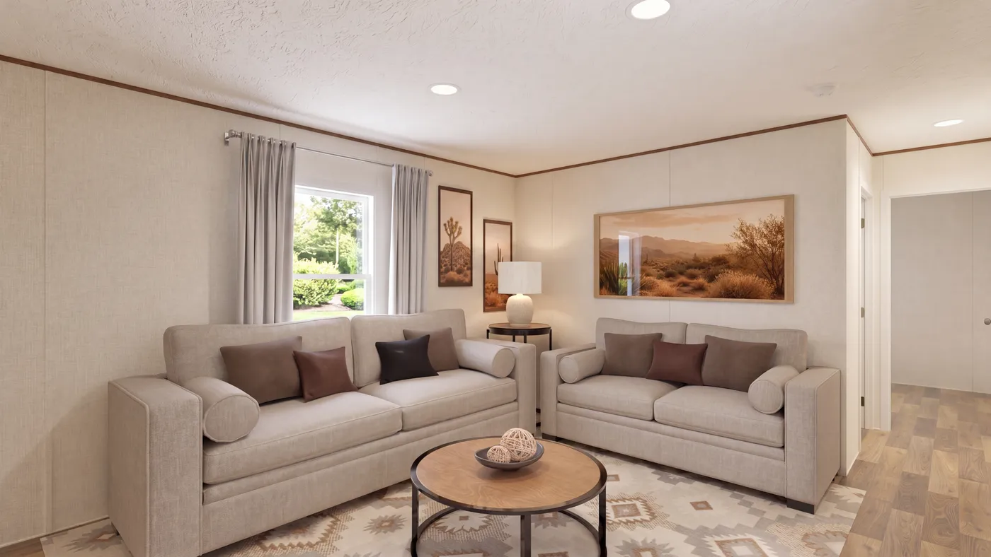 The DOGWOOD Living Room. This Manufactured Mobile Home features 2 bedrooms and 2 baths.