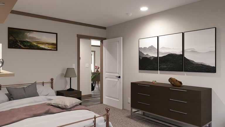 The LIZZIE ELITE Bedroom. This Manufactured Mobile Home features 3 bedrooms and 2 baths.