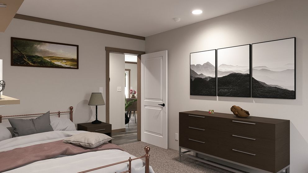 The LIZZIE ELITE Bedroom. This Manufactured Mobile Home features 3 bedrooms and 2 baths.