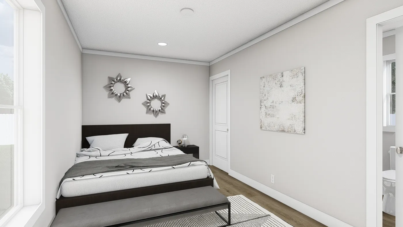 The YESTERDAY Primary Bedroom. This Manufactured Mobile Home features 1 bedroom and 1 bath.