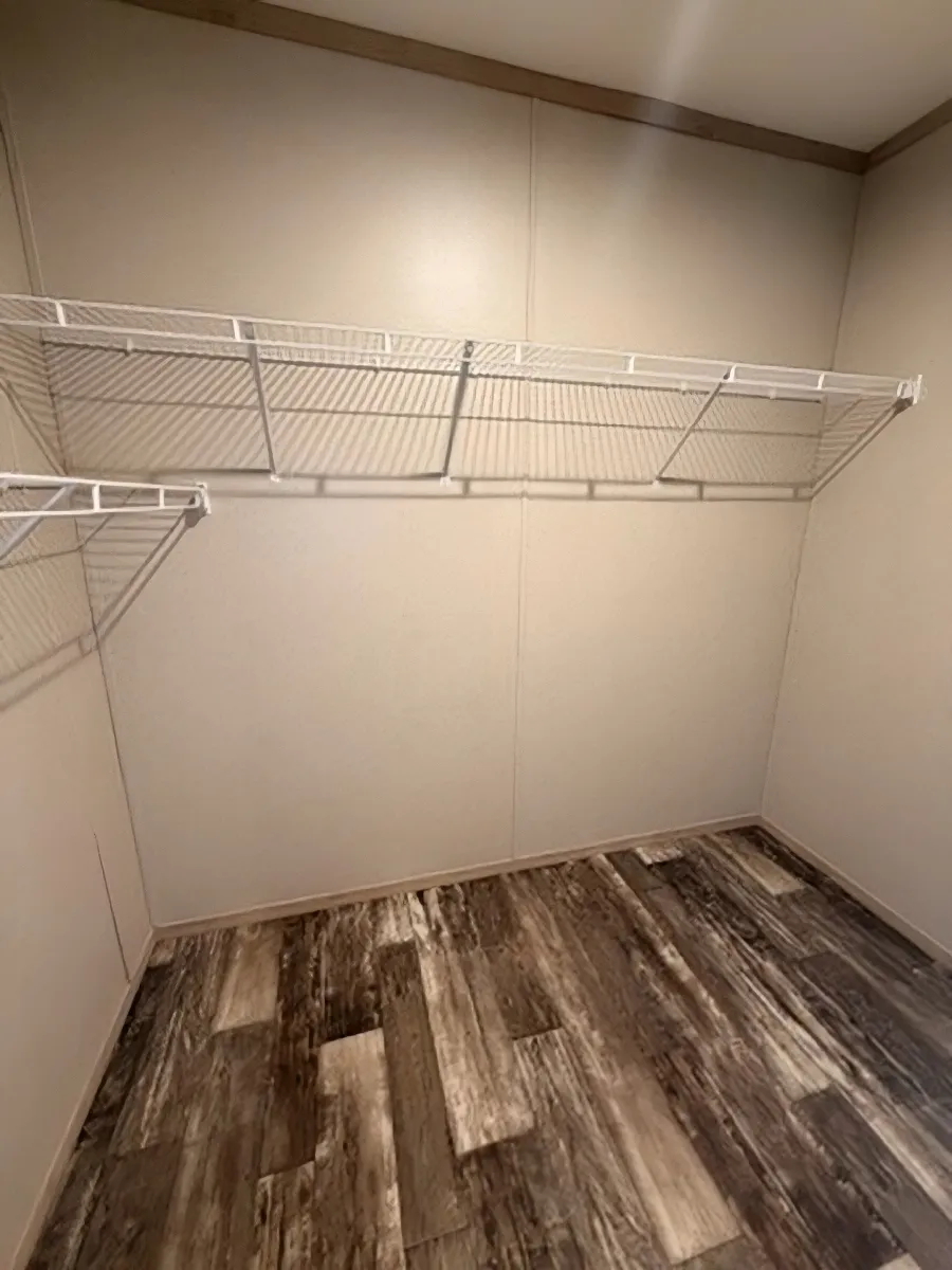 The AMETHYST Walk in Closet in Primary Bedroom.