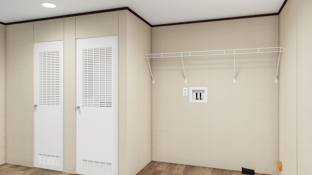 The THRILL Utility Room. This Manufactured Mobile Home features 3 bedrooms and 2 baths.