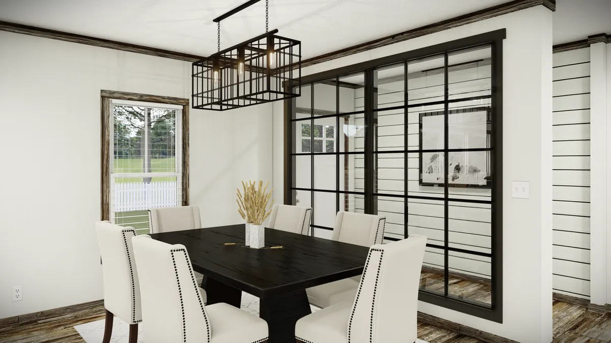 The THE SUMNER Dining Room. This Manufactured Mobile Home features 3 bedrooms and 2 baths.