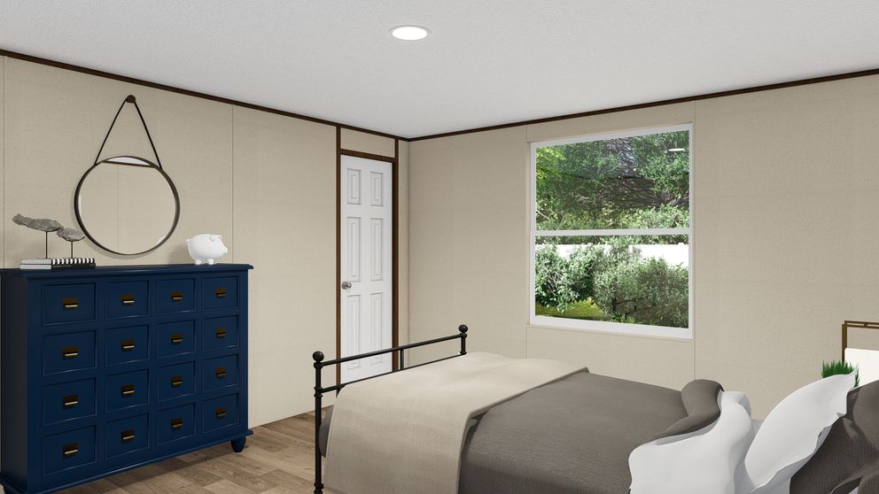 The TRIUMPH Bedroom. This Manufactured Mobile Home features 5 bedrooms and 3 baths.