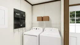 The COLOSSAL Utility Room. This Manufactured Mobile Home features 3 bedrooms and 2 baths.