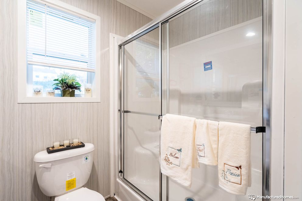 The TOPAZ 70 Primary Bathroom. This Manufactured Mobile Home features 3 bedrooms and 2 baths.