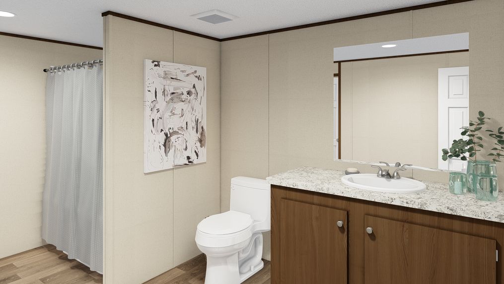 The MARVEL Primary Bathroom. This Manufactured Mobile Home features 4 bedrooms and 2 baths.