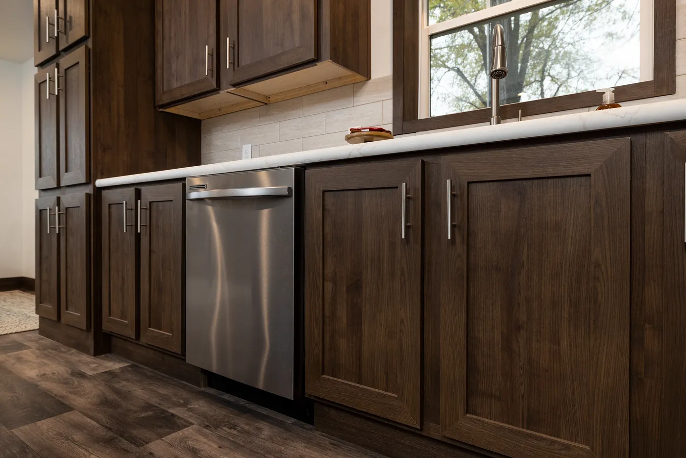 The RAMSEY 75 Kitchen. This Manufactured Mobile Home features 4 bedrooms and 2 baths.