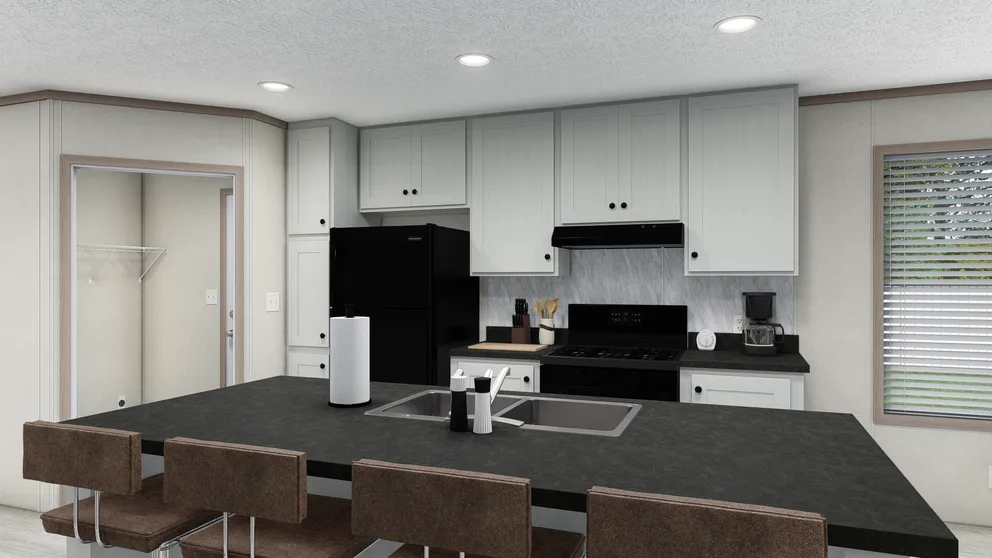 The 7616-4700 THE PULSE Kitchen. This Manufactured Mobile Home features 3 bedrooms and 2 baths.