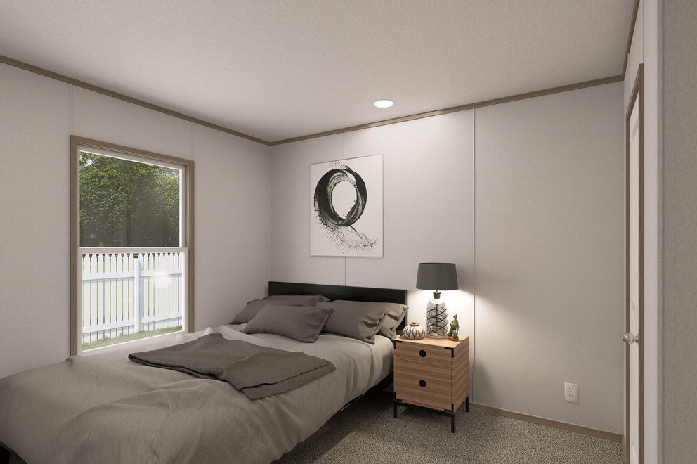 The THE EAGLE 48 Bedroom. This Manufactured Mobile Home features 3 bedrooms and 2 baths.