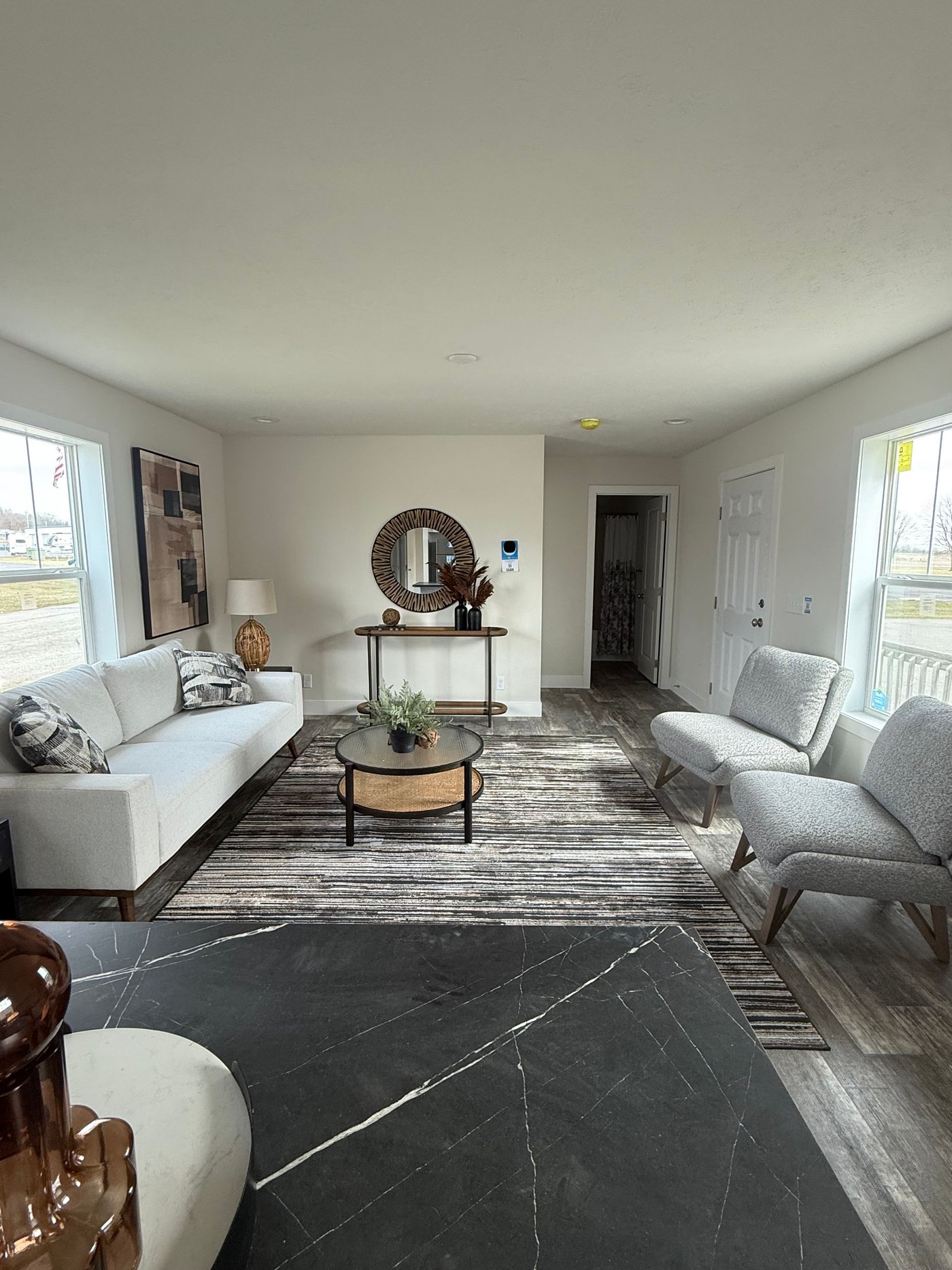 The 6016-SW019 SUNRISE SW Living Room. This Manufactured Mobile Home features 2 bedrooms and 2 baths.