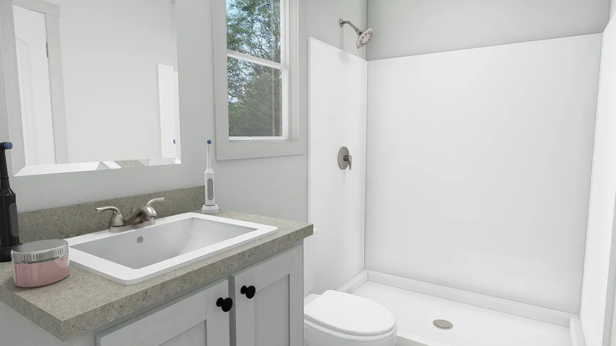The RESPECT Primary Bathroom. This Manufactured Mobile Home features 2 bedrooms and 2 baths.