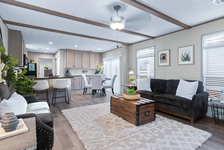The ANNIVERSARY 16763A Living Room. This Manufactured Mobile Home features 3 bedrooms and 2 baths.