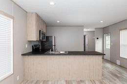 The BLAZER 48 A Kitchen. This Manufactured Mobile Home features 2 bedrooms and 1 bath.