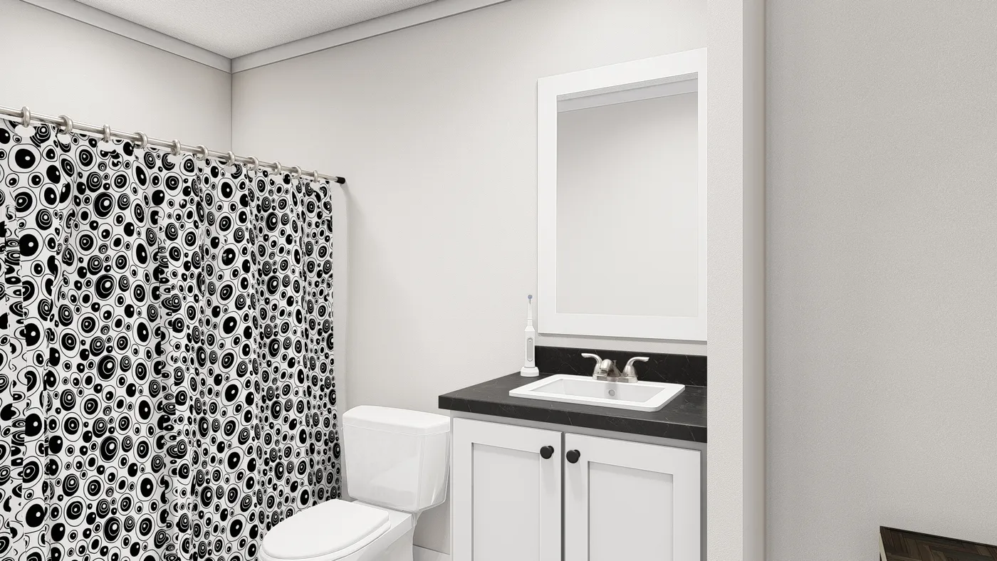 The WHOLE LOTTA LOVE Guest Bathroom. This Manufactured Mobile Home features 3 bedrooms and 2 baths.