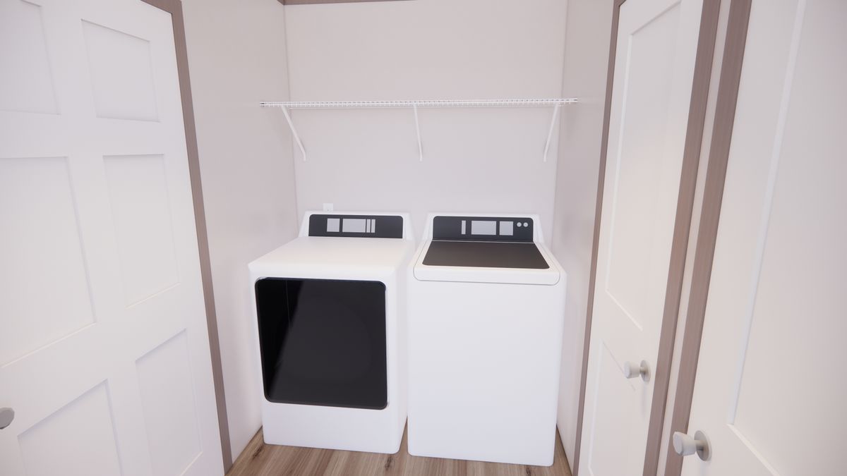 The 5228-E201 ADRENALINE Utility Room. This Manufactured Mobile Home features 3 bedrooms and 2 baths.
