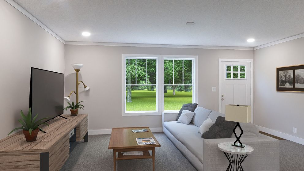 The SHOUT Living Room. This Manufactured Mobile Home features 3 bedrooms and 2 baths.