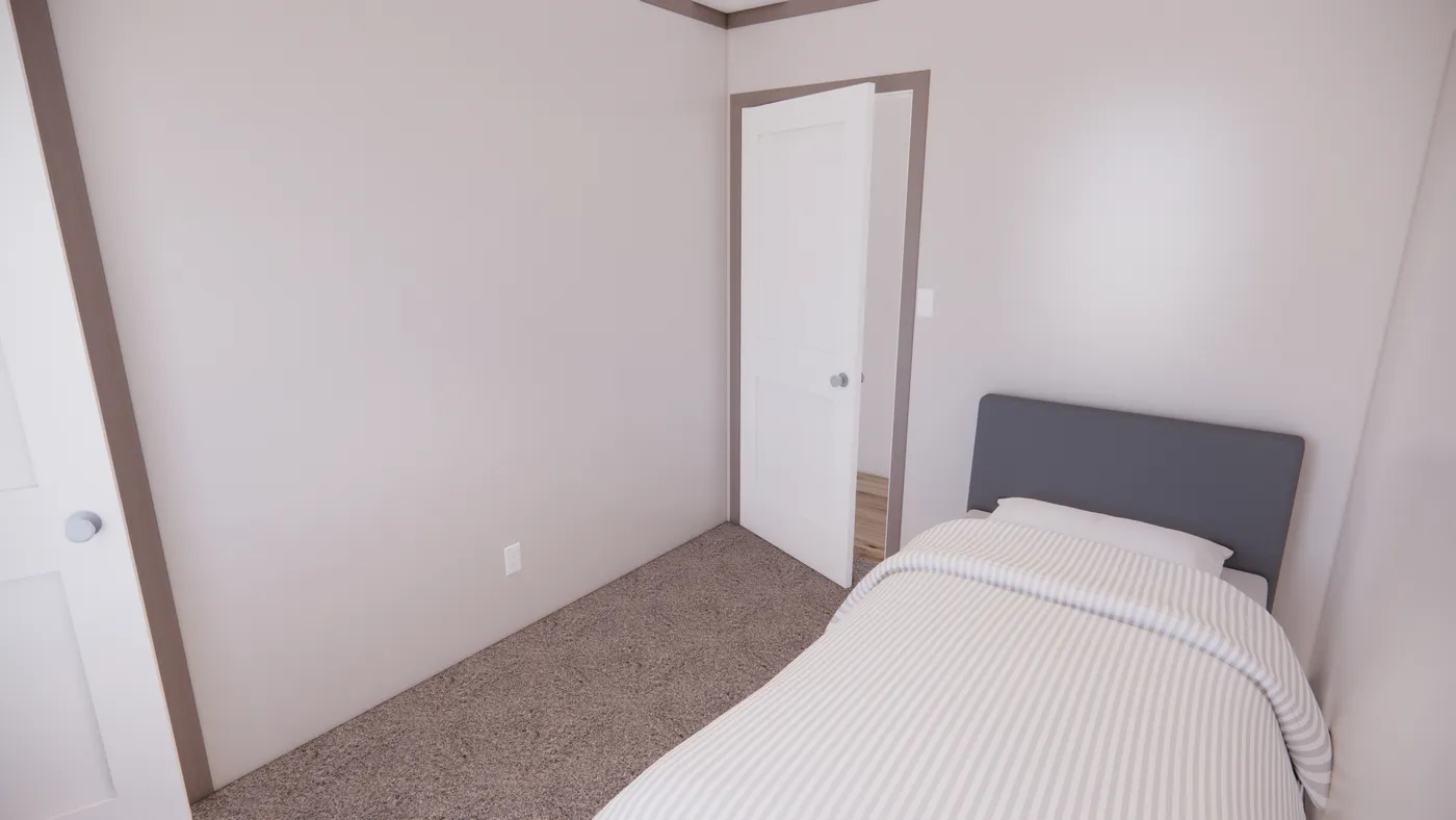 The 7216-4203 ADRENALINE Guest Bedroom. This Manufactured Mobile Home features 3 bedrooms and 2 baths.