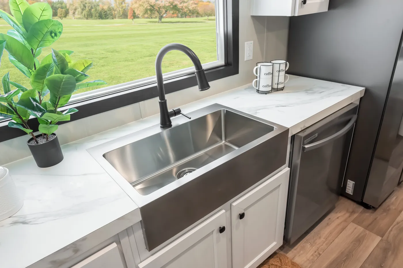 The THE ANNIVERSARY 2.1 Kitchen. This Manufactured Mobile Home features 3 bedrooms and 2 baths.