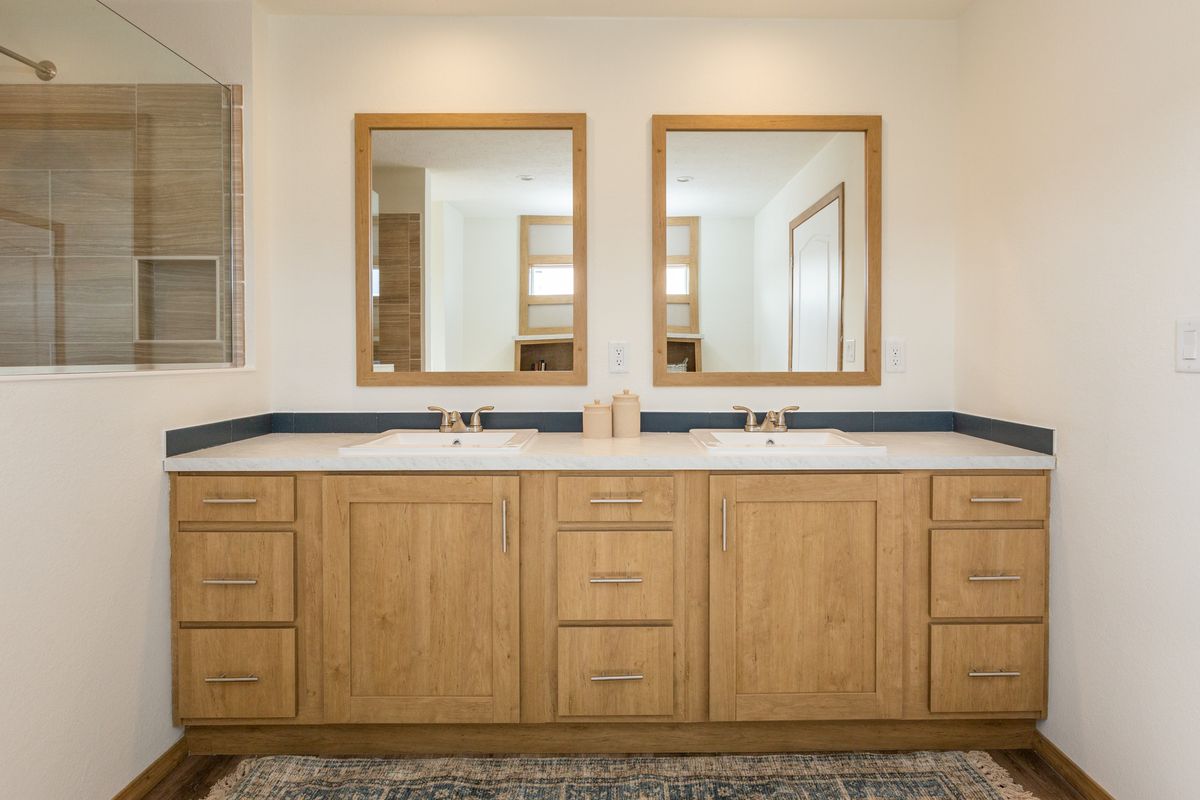 The THE ANTHONY Master Bathroom. This Manufactured Mobile Home features 2 bedrooms and 2 baths.