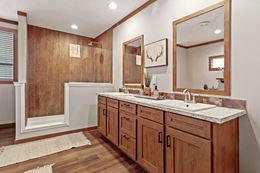 The THE DURANGO Primary Bathroom. This Manufactured Mobile Home features 3 bedrooms and 2 baths.