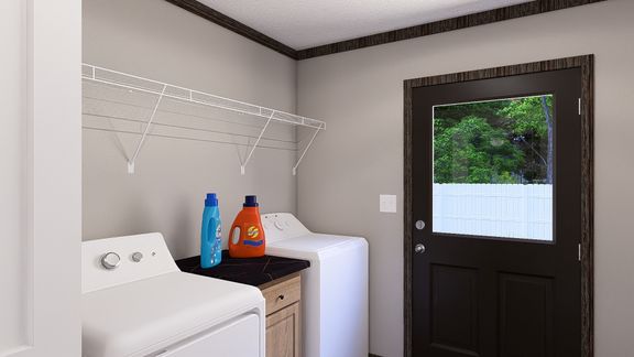 The THE JACKSON Utility Room. This Manufactured Mobile Home features 4 bedrooms and 2 baths.