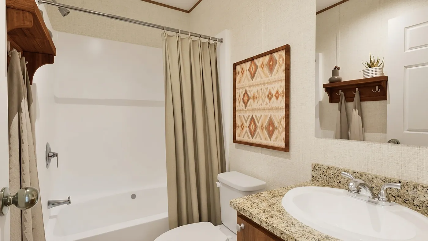 The ASPEN Guest Bathroom. This Manufactured Mobile Home features 3 bedrooms and 2 baths.