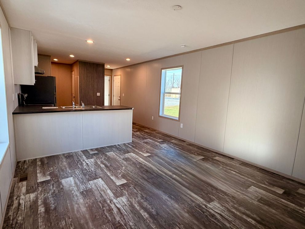 The JEFFERSON Living Room. This Manufactured Mobile Home features 3 bedrooms and 2 baths.