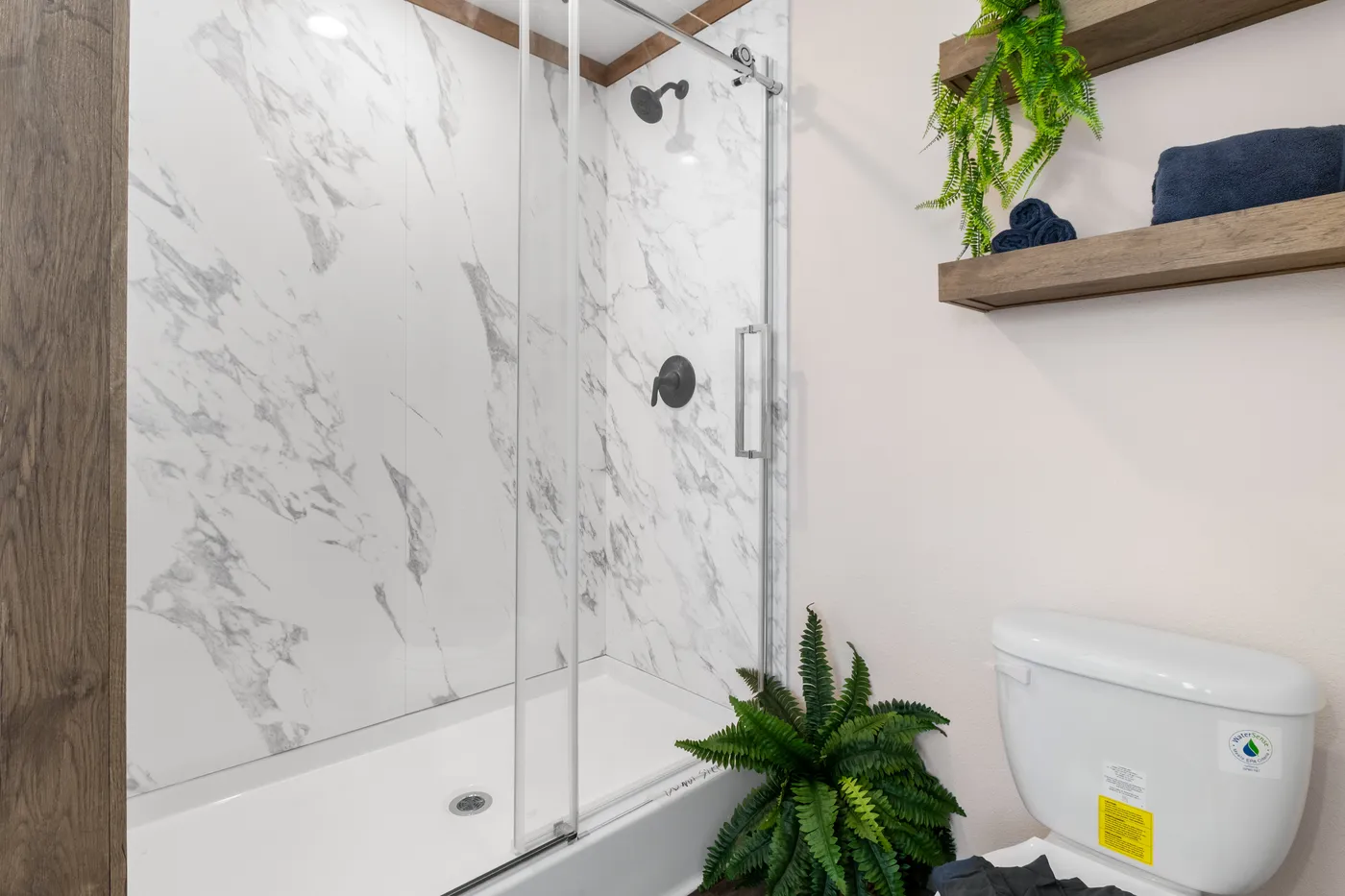 The FARM 4 FLEX Primary Bathroom. This Manufactured Mobile Home features 4 bedrooms and 3 baths.