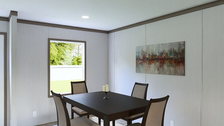 The ULTRA ISLAND BREEZE 56' Dining Area. This Manufactured Mobile Home features 3 bedrooms and 2 baths.