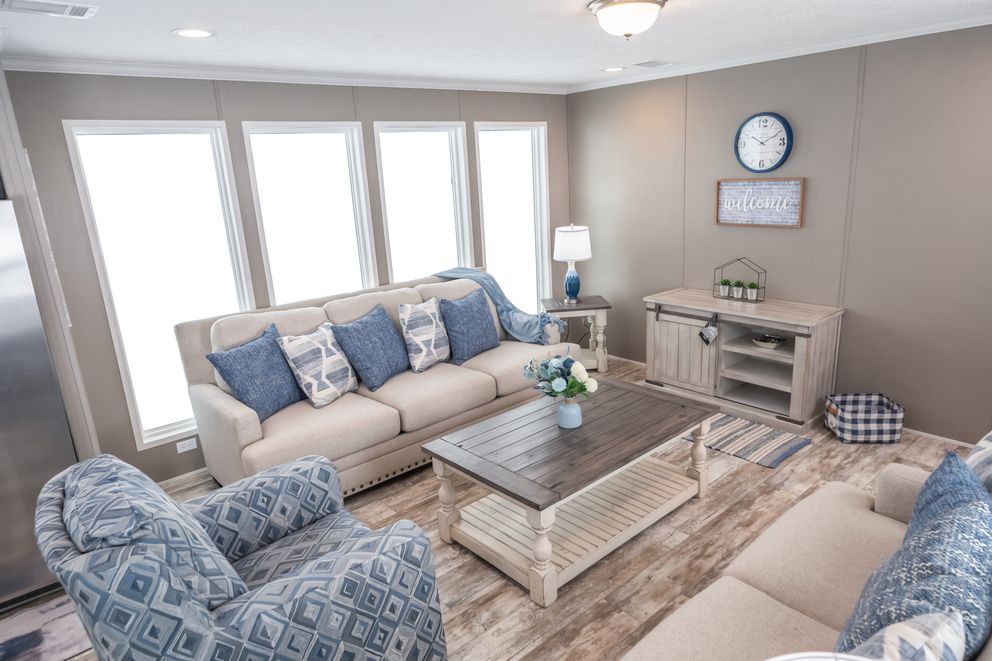 The MAJOR Living Room. This Manufactured Mobile Home features 3 bedrooms and 2 baths.