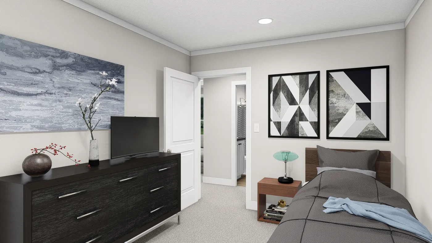 The HERE COMES THE SUN Guest Bedroom. This Manufactured Mobile Home features 3 bedrooms and 2 baths.